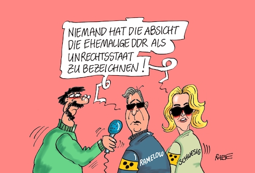 Cartoon: Unrechtsstaat DDR (medium) by RABE tagged tag,einheit,wiedervereinigung,grenze,mauerfall,feiertag,ost,west,ossi,wessi,brücke,brett,rabe,ralf,böhme,cartoon,karikatur,pressezeichnung,farbcartoon,tagescartoon,zonengrenze,bürgerbewegung,demos,ddr,unrecht,unrechtsstaat,manuela,schwesig,spd,bodo,ramelow,linke,stasi,mauertote,tag,einheit,wiedervereinigung,grenze,mauerfall,feiertag,ost,west,ossi,wessi,brücke,brett,rabe,ralf,böhme,cartoon,karikatur,pressezeichnung,farbcartoon,tagescartoon,zonengrenze,bürgerbewegung,demos,ddr,unrecht,unrechtsstaat,manuela,schwesig,spd,bodo,ramelow,linke,stasi,mauertote