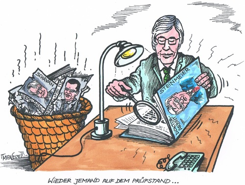 Cartoon: Auf dem Prüfstand (medium) by mandzel tagged doktorarbeit,steinmeier,überprüfung,papierkorb,doktorarbeit,steinmeier,überprüfung,papierkorb